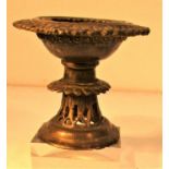 Cast brass candle holder from Afghanistan. 10cm diam. X 10cm. Late 20th c.