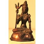 Cast bronze of the Indian god Shiva sitting crossed legged, holding a trident. India. 14 x 8cm. New