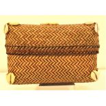 Rattan and cowrie shell basket from Lombok. 20 x 14cm.