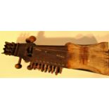 Sarangh musical instrument from Asia, this is from Afghanistan. Carved from a single block of red