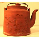 Ceramic tea pot with leaf strainer and metal handles. Decorated in Chinese style. The stamp on the