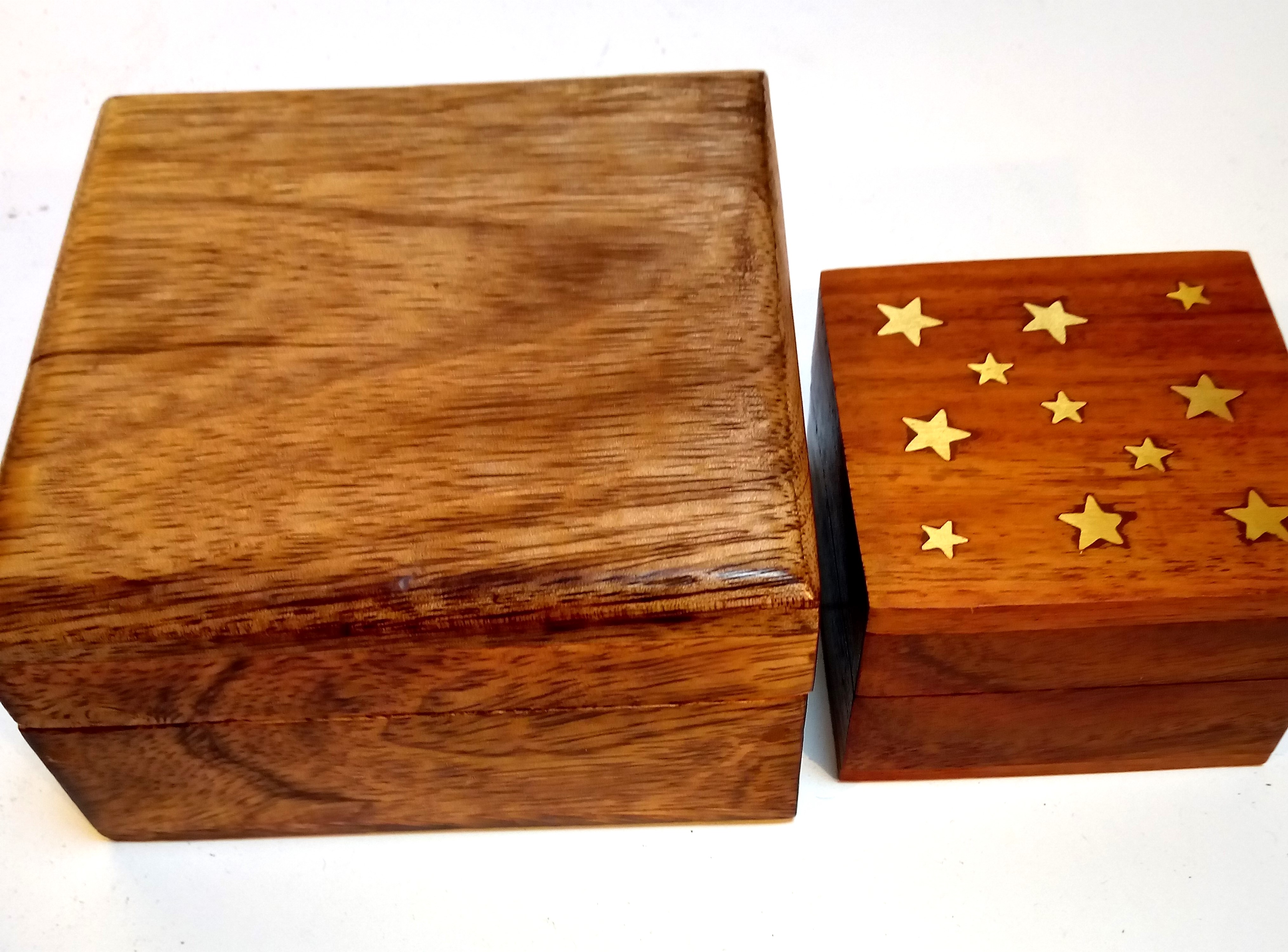 Two boxes from India. A square storage box of Mango wood with lid and a small hardwood trinket box