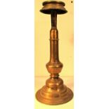 Nepalese brass candle stick. The oil dish on the top would easily hold a church candle. 48 x 20cm