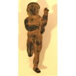 Tiny metal figure, reputed by a collector to be Gandhara era. One arm raised, one arm across chest