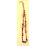 Necklace of antique Afghan metal beads and coral. 26cm.