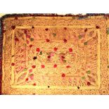 Hazara bread cover from central Afghanistan. Silk with couched gold thread and little tufts of silk.