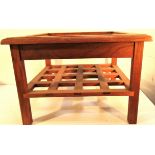 Hard wood stool with shelf and recessed top suitable for glass or cushion. 52 x 52 x 25cm.