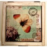 Storage box with orange tip butterfly and postage mark designed tile on the lid. Painted white