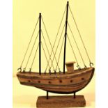 Small wood and painted boat with full rigging. 22 x 30cm. New
