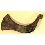 Bronze axe head with a mythical bird decoration. 12cm.