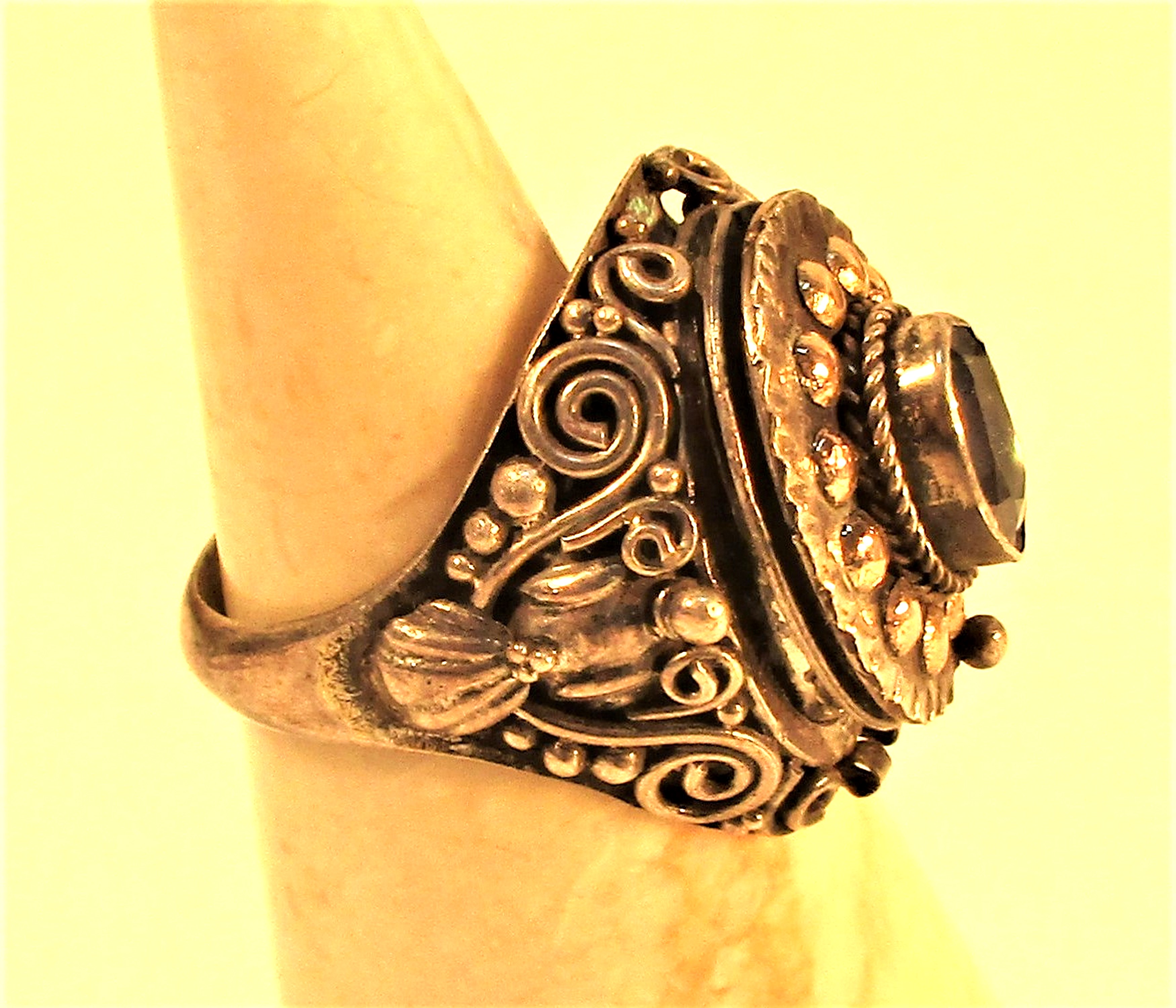 Metal with gold wash and glass stone ring with a secret compartment. - Image 2 of 2