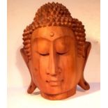 Hand carved wood Buddha head from Pule, crocodile wood. It was carved in the traditional wood