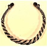 Antique Turkoman twisted white metal torc decorated with twisted wire that adds to the decoration.