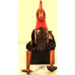 Painted sitting chicken also with flappy legs and wings. 22 x 10cm. New