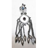 Part of another head dress. White metal with cornelian and turquoise stones and chain drops. 24x