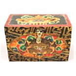 Hand painted wood box from Tibet. The painting depicts Chepu, the guardian god and traditional