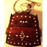 Tobacco pouch possibly from Lombok or Java. . Made from a hardwood with fragments of shell. 12 x