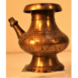 Nepal. Hindu temple puja brass water bottle. Every household will have a container for special water