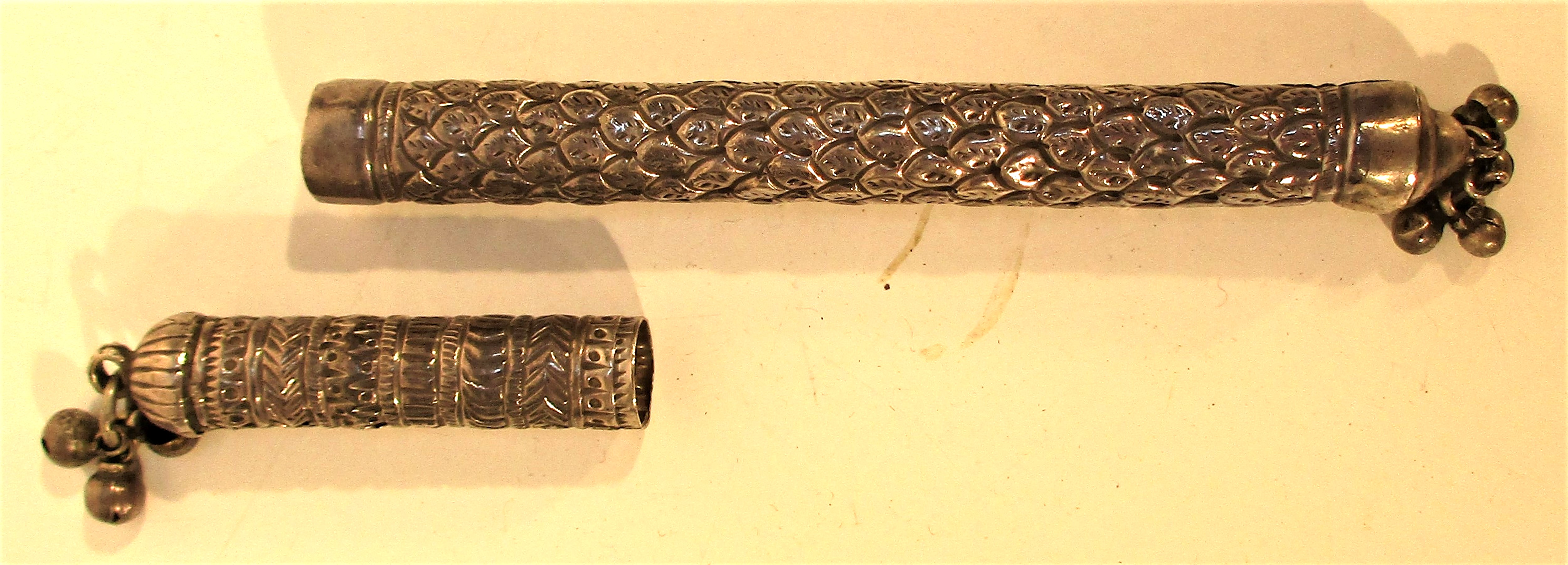 A scribes quill holder. Engraved with tiny bells on the ends. 18cm. long - Image 2 of 2
