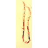 Necklace of an assortment of semi precious stones, antique metal beads and sandal wood beads. 25cm.
