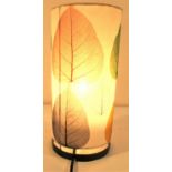 Table lamp made from cotton printed with pepal leaves on metal frame. 33 x 21cm. New