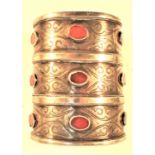 A very traditional antique Turkoman bracelet. White metal with gold wash and 9 cornelians. This is a