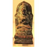 Cast bronze of Buddha in prayer sitting crossed legged on a lotus leaf in the prayer and teaching
