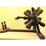 A very basic Spinning Wheel from Nuristan. Carved from hardwood. 90 x 60cm. Mid 20th c.