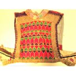 Turkoman dress front. This is typical Turkoman embroidery and patterning. It would have been applied