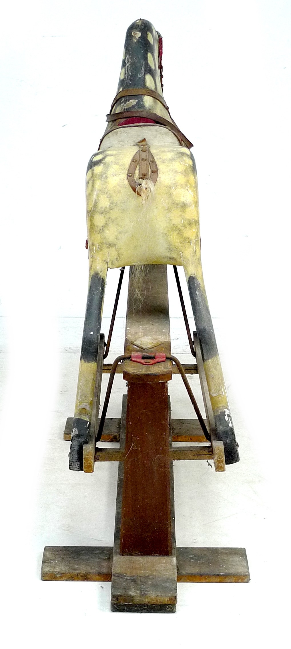 A mid 20th century carved wooden rocking horse, dappled grey coat, red saddle, on a pine base with - Image 3 of 4