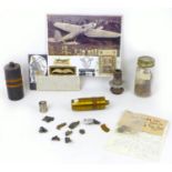 A collection of WWII German aircraft relics, including ephemera from a Heinkel bomber crash,