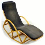 An Angrave's 'Invincible' cane recliner chair, circa 1960, with black padded cushion 131 by 60 by