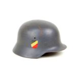 A WWII era German Luftwaffe steel helmet, with leather lining and chin strap, its aluminium internal