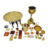 A large collection of brass and metal wares, including a jardiniere stand, and a 'Benares' table,
