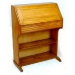 An oak student's desk bureau, circa 1960, with fall front and fitted interior, 76.5 by 36.5 by 100cm