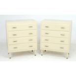 A pair of retro cream painted chests, circa 1950, each with four drawers, slender bar handles, and