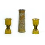 Three WWI trench art shell case vases, comprising a vase with single flower motif, made from a 1917,
