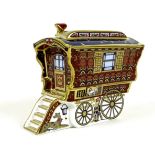 A Royal Crown Derby paperweight, modelled as 'The Ledge Wagon Gypsy Caravan', one of a limited