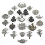A collection of British Army regimental badges, including Cornwall, Somerset and Cornwall,