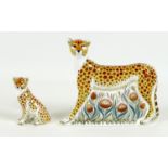 Two Royal Crown Derby paperweights, modelled as 'Cheetah Daddy', MMXI, gold stopper, 13.5cm high,
