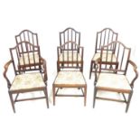 A set of six early 19th century mahogany dining chairs, each 52 by 51 96cm high, including two