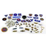 A collection of over seventy WWI and later air force badges and buttons, including an WWI RFC