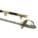 A Naval Officer's dress sword, with wire bound shagrin locking grip, with lion's head pommel, the