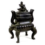 A Chinese bronze censer, late Ming / early Qing Dynasty, of archaic form with two high stylised