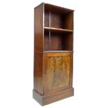 A Victorian mahogany cupboard, with open shelf and door below, 56 by 31 by 138.5cm high.