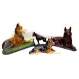 Four large canine figurines, comprising a bronzed metal Bulldog, 30 by 13.5 by 25cm hight, and