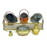 A collection of copper and brass items, including fire fender, jardiniere, coal scuttle, ewer, hot