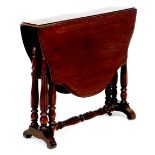 A Victorian mahogany Sutherland table, with shaped drop leaves, lobed baluster supports joined by
