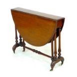 A Victorian mahogany Sutherland table, with oval drop leaf surface, turned supports joined by a