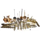 A collection of brass and copper items, including horse brasses, animal sculptures, a pair of silver